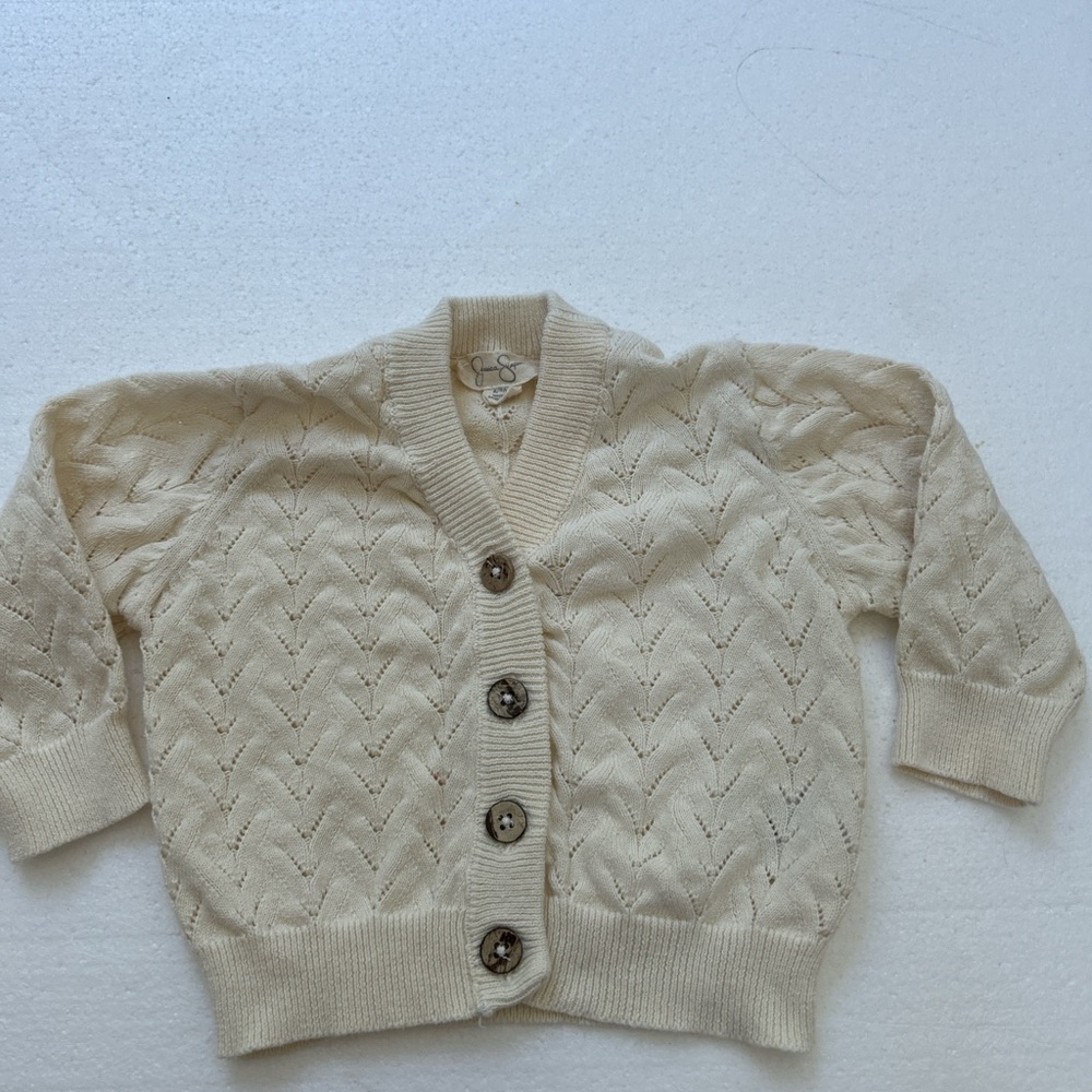 Neutral minimalist Cream baby girls cardigan sweater by Jessica Simpson